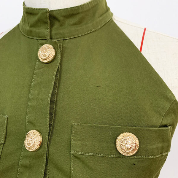 Military-style green jacket featuring gold lion-emblem buttons and a high collar, showcasing detailed craftsmanship and a structured design.