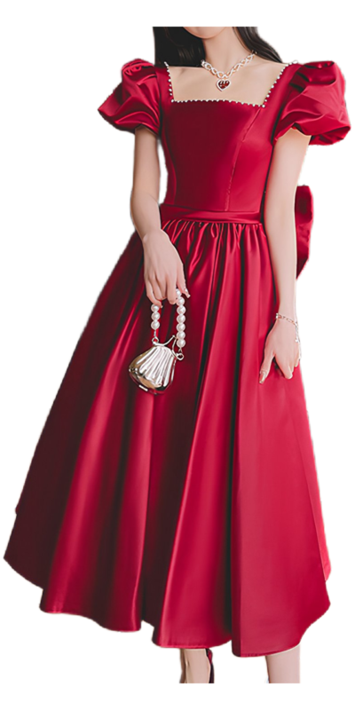 Elegant red satin dress with puff sleeves and a square neckline, styled with a matching bow at the back, perfect for formal events or special occasions.