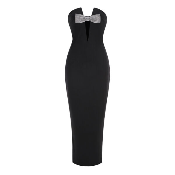 Elegant black evening gown featuring a plunging neckline and a stylish silver bow detail at the front. Perfect for formal occasions and special events.