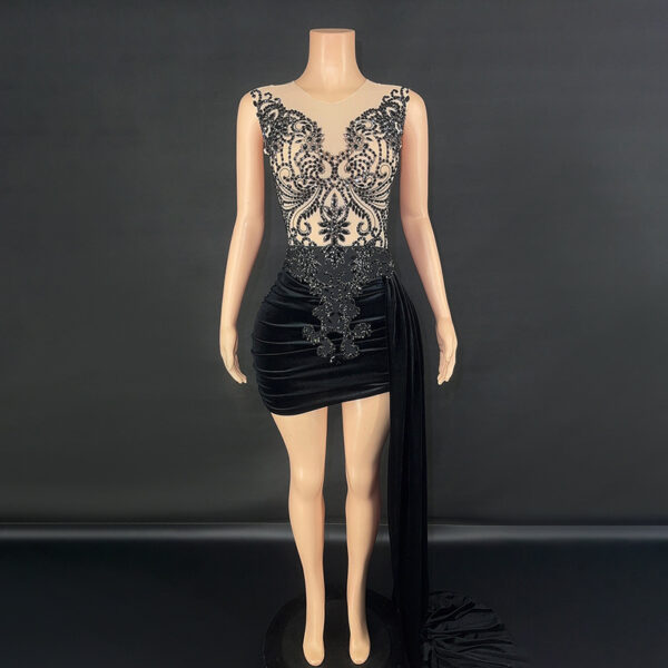 Elegant black cocktail dress featuring intricate beaded embroidery and a fitted silhouette, displayed on a mannequin against a dark background. Perfect for formal occasions or evening events.