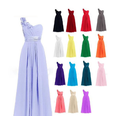 Elegant one-shoulder evening dress in lavender, featuring a floral accent and pleated design, displayed alongside a variety of color options including red, black, white, yellow, green, and pink. Perfect for formal occasions and weddings.