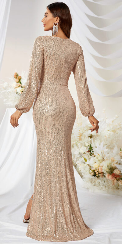 Elegant woman wearing a shimmering gold sequin evening gown, showcasing a fitted silhouette and long sleeves. The image captures her from the back, highlighting the dress's intricate detailing against a soft, floral backdrop. Perfect for formal events or special occasions.