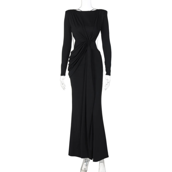 Elegant black evening gown featuring long sleeves, a fitted silhouette, and a stylish twisted design at the waist. Perfect for formal occasions and special events.