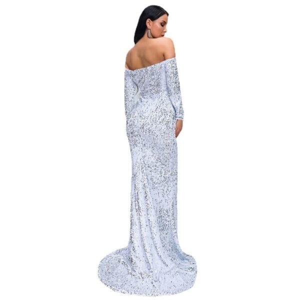 Elegant off-shoulder silver sequin evening gown featuring a fitted silhouette and train, showcasing a stylish back view. Perfect for formal events and special occasions.