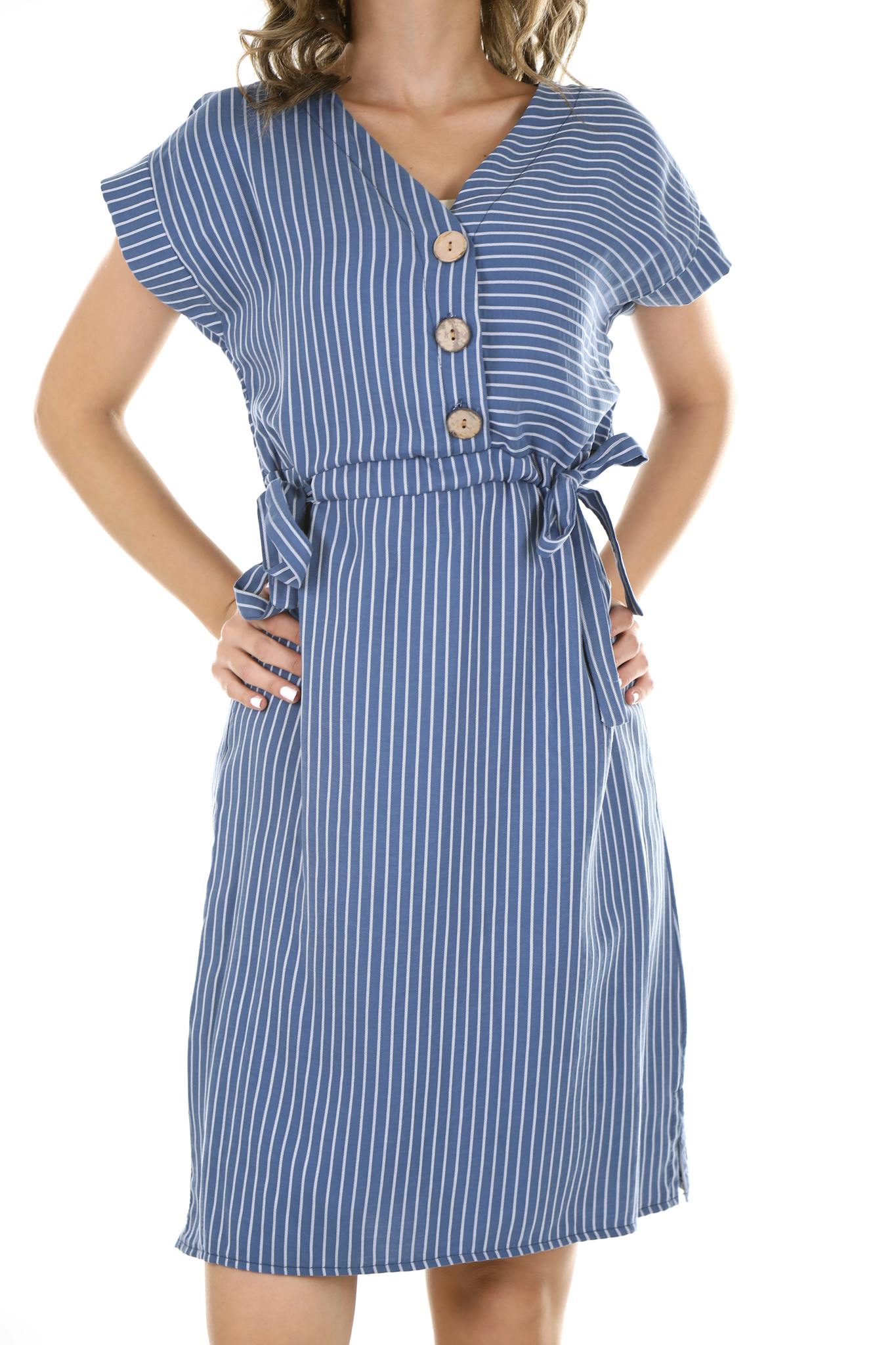 Elegant blue striped dress with wooden buttons, perfect for summer fashion.